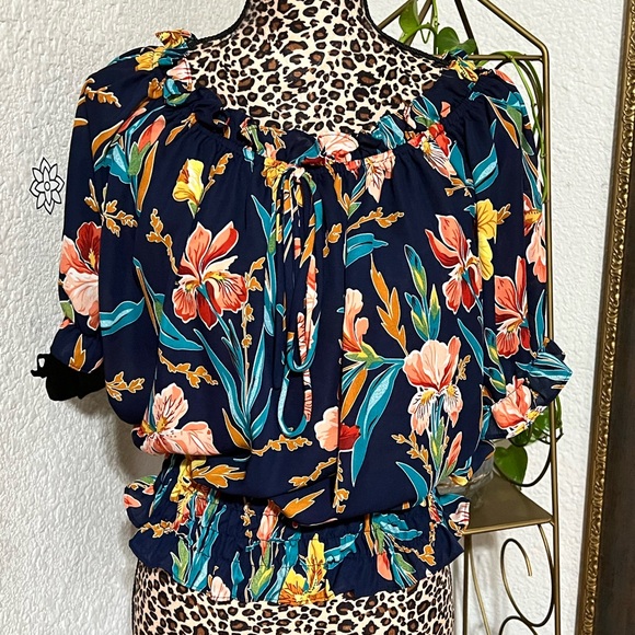 Get the feel of Hawaii with this beautiful floral print top. - Picture 2 of 3